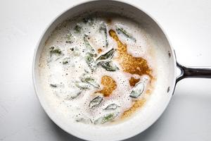 browned butter and sage leaves in a skillet