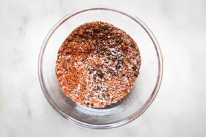 paprika, garlic powder, pepper, salt and garlic powder mixed together in a bowl