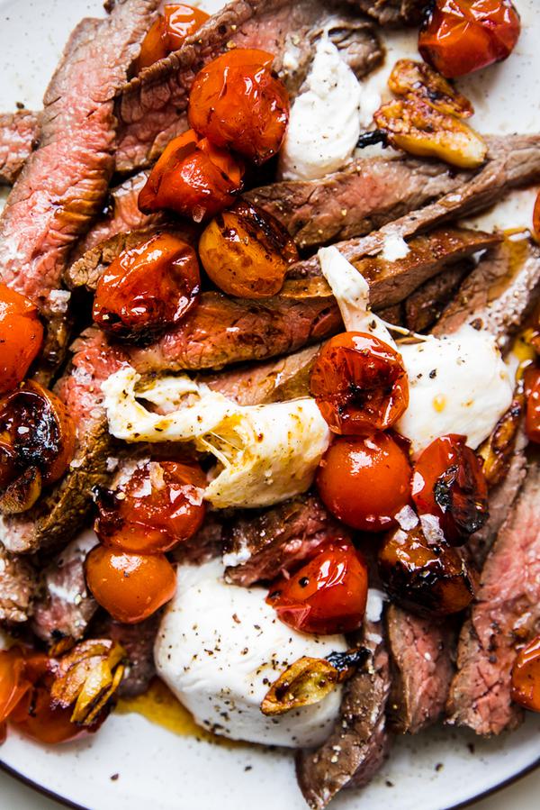 grilled skirt steak with blistered tomatoes and burrata