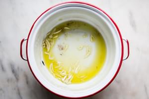 extra virgin olive oil and roughly chopped garlic in a pot