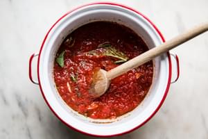 canned crushed tomatoes, fresh basil, salt, Italian seasoning, garlic and olive oil mixed together in a large sauce pan