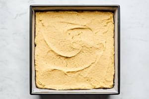 homemade cornbread batter in a greased 9x9 baking dish