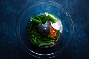 Greek yogurt, Cilantro, Lime juice, Garlic powder, Sea salt, Jalapeño, Chili powder and green onions in a food processor.