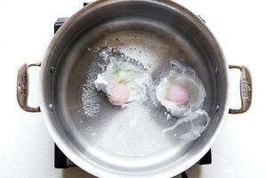 2 eggs in simmering water