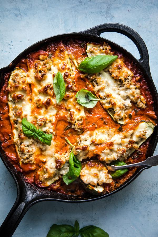 Italian Stuffed Zucchini Boats with ground chicken, basil, mozzarella and tomato cream sauce