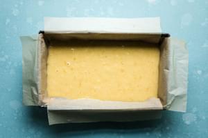 olive oil pound cake batter in a cake pan