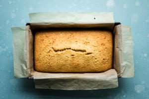 olive oil cake made with lemon baked in a loaf pan