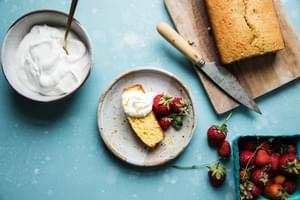 lemon olive oil pound cake with fresh berries and whipped cream,