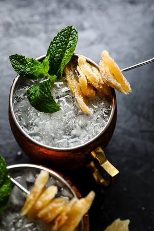 homemade Moscow Mule with ginger, lime and mint in a copper mug.