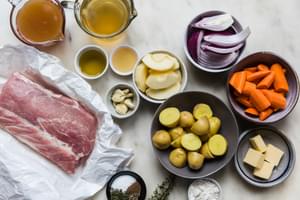 raw pork roast, apple cider, carrots, potatoes, onions, butter, salt and pepper garlic and olive oil for pork roast recipe