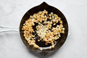 onion, brown sugar and garlic cooking in butter in a skillet