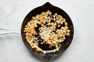 onion, brown sugar and garlic cooking in butter in a skillet
