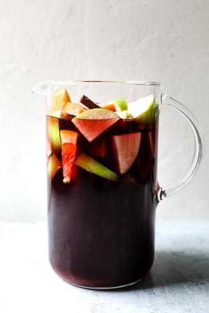 Red Wine Sangria Recipe with cinnamon, apples, oranges, brandy and triple sec.