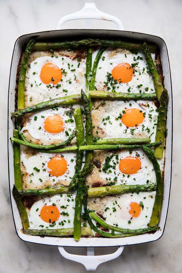 Potato Rösti with Eggs and Asparagus  in a casserole dish
