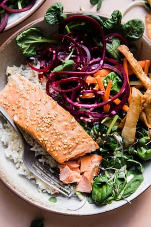 salmon bowl with ponzu marinade, sesame seeds and a creamy sesame dressing