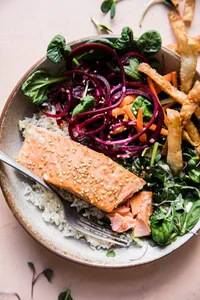 Salmon rice bowl with beets, carrots, sesame and ponzu