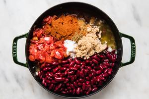 ingredients for a simple chili recipe in a pot on the counter