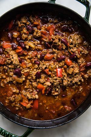 a pot of homemade chili in a on the counter