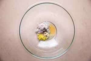 Shallot lemon juice, olive oil, lemon zest salt and pepper and honey in a bowl