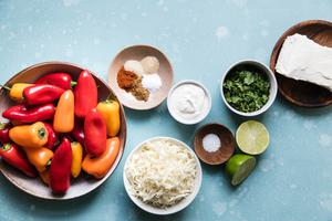 mini bell peppers, lime, mozzarella, spices, and cream cheese for stuffed peppers