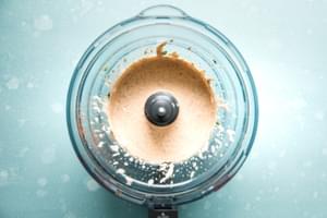 sour cream, taco seasoning, lime juice, salsa, minced jalapeño, cilantro and salt in food processor for taco salad dressing