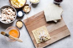 puff pastry square filled with mashed potatoes and turkey