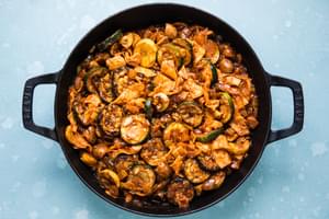 homemade vegetarian enchilada skillet made with zucchini, squash mushrooms and onions in a skillet