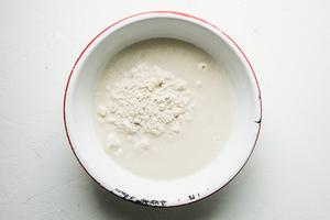 A bowl of masa and water for homemade corn tortillas