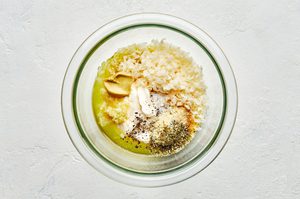 mayo, lemon juice, olive oil, parmesan, dijon and spices in a bowl to make creamy parmesan lemon dressing