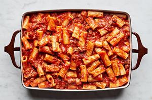 rigatoni with marinara sauce, italian sausage and ground beef in a 9x13 casserole dish