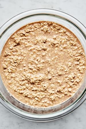 oats, eggs, milk, maple syrup, vanilla, butter, brown sugar, salt, cinnamon, nutmeg and baking powder in a large mixing bowl