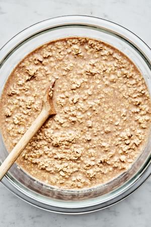oats, eggs, milk, syrup, vanilla, butter, brown sugar, salt, cinnamon, nutmeg and baking powder in a large mixing bowl