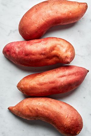 4 sweet potatoes on the counter