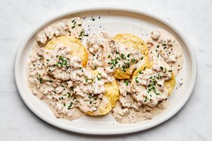 A plate of homemade biscuits with sausage gravy. A classic comfort breakfast.