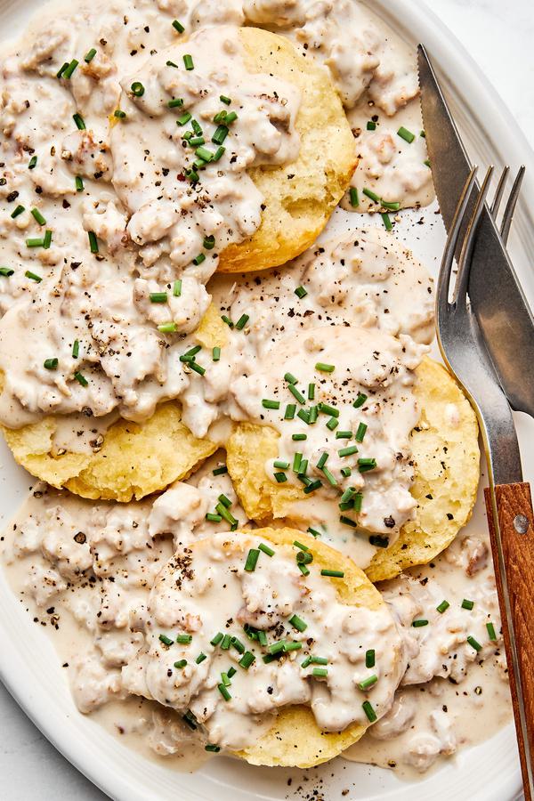 A plate of homemade biscuits with sausage gravy. A classic comfort breakfast.