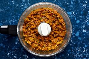 carrots, cilantro, cumin, onion, salt, paprika, chili powder, egg and breadcrumbs pulsed in a food processor