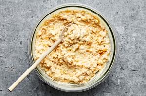 flour, cornmeal, sugar, salt, baking powder, butter, eggs, creamed corn, whole corn, sour cream & cheese mixed together