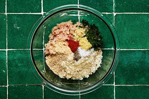 ground chicken, breadcrumbs, Basil, garlic, parmesan, paprika, salt, pepper, & mustard powder in a bowl for burger patties