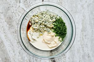 mayo, sour cream, Worcestershire, lemon juice, white vinegar, chives, cream & blue cheese in a bowl for blue cheese dressing