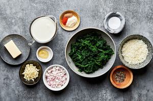 spinach, butter, shallot, garlic, cream, dijon, parmesan, salt, pepper, nutmeg, garlic powder and cayenne in bowls