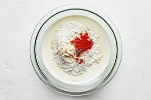 flour, garlic powder, cayenne pepper, salt and pepper in a bowl to use as breading for fried chicken