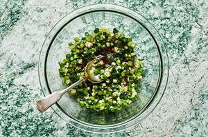 Scallion Oil in a bowl made with scallions, ginger, garlic, soy sauce, rice vinegar, fish sauce & vegetable oil