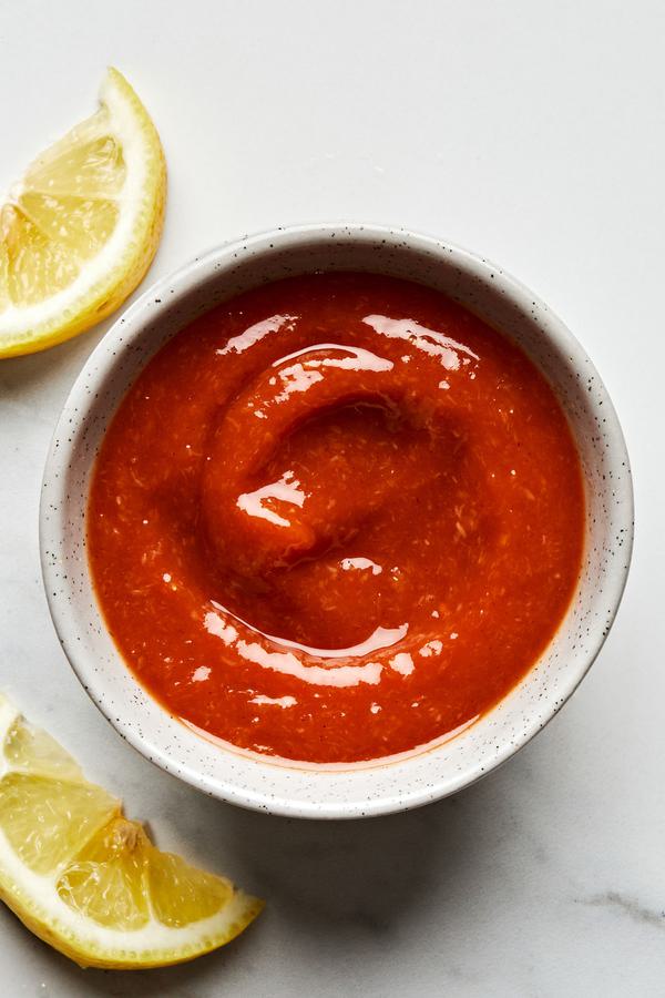 homemade cocktail sauce in a bowl made with ketchup, horseradish, Worcestershire, Dijon, Tabasco, applesauce & lemon zest