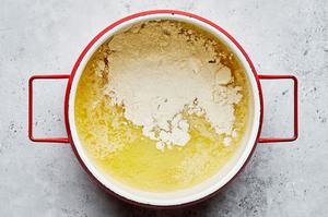 melted butter and flour in a large sauce pan to make gravy for homemade poutine recipe