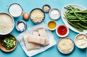 fish, green beans, rice, coconut milk, ginger, sugar, salt, mayo, sweet chili sauce, coconut & macadamia nuts in bowls