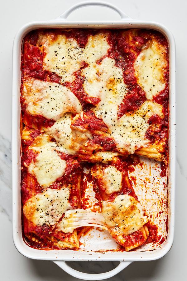 homemade manicotti in a 9x13 baking dish