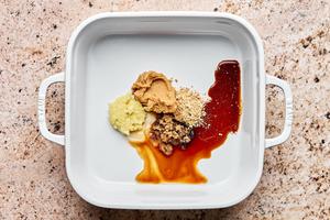 ground ginger, miso paste, sesame oil, soy sauce, vinegar, brown sugar, and grated ginger in a dish to marinate salmon