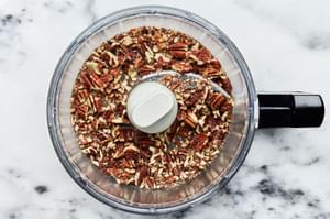 pecans roughly chopped in the base of a food processor for nutty carrot dip