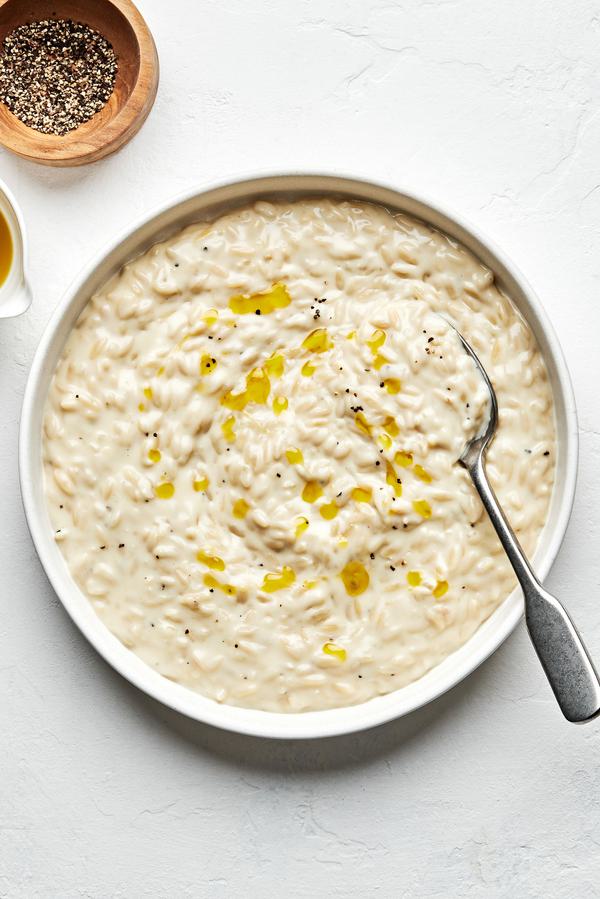 orzo risotto made with chicken broth, shallot, garlic, white wine, salt, butter, cream, manchego cheese and pepper