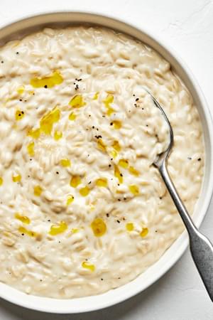 orzo risotto made with chicken broth, shallot, garlic, white wine, salt, butter, cream, manchego cheese and pepper